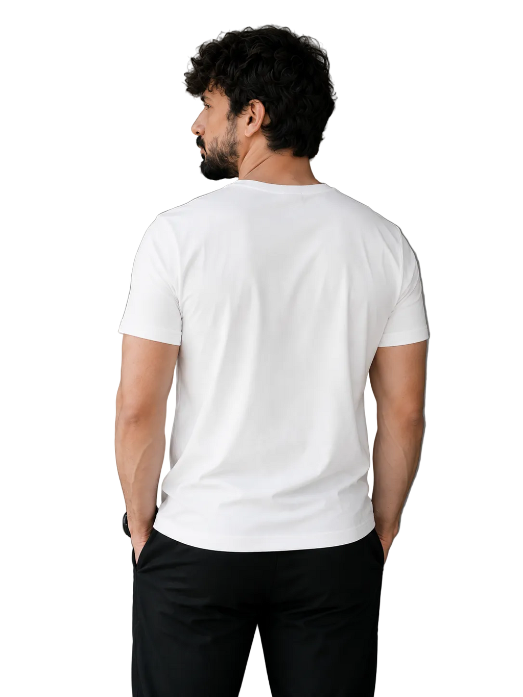 A man viewed from behind wearing a plain white short-sleeve crewneck t-shirt and black pants, standing in a minimalist indoor setting with a gray wall and a potted plant.