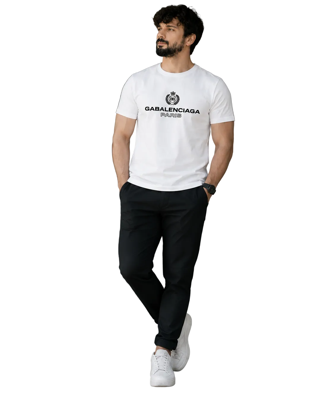 A man wearing a white Balenciaga t-shirt with black joggers and white sneakers, walking in a modern indoor setting with a glass wall and staircase.