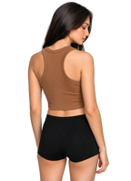 A woman shown from the back wearing a brown ribbed crop top and black shorts against a plain light gray studio background.