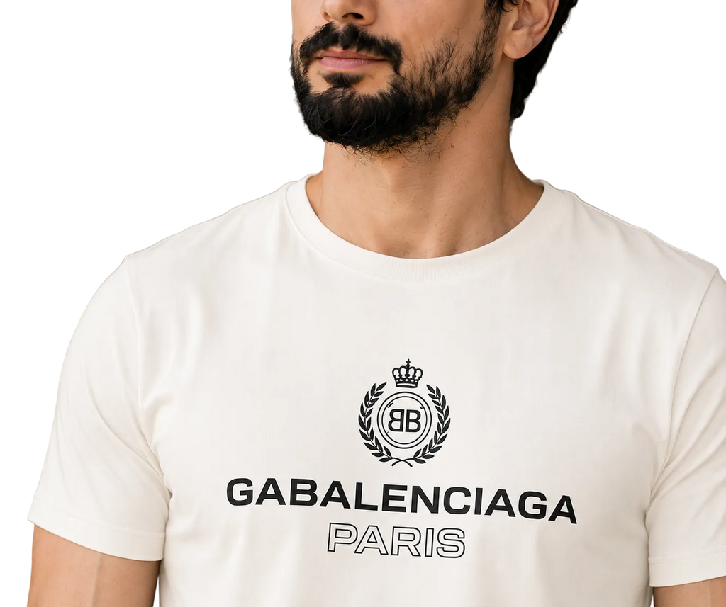 A close-up of a man wearing a cream-colored t-shirt with a black 'GABALENCIAGA PARIS' logo and crest printed on the chest.