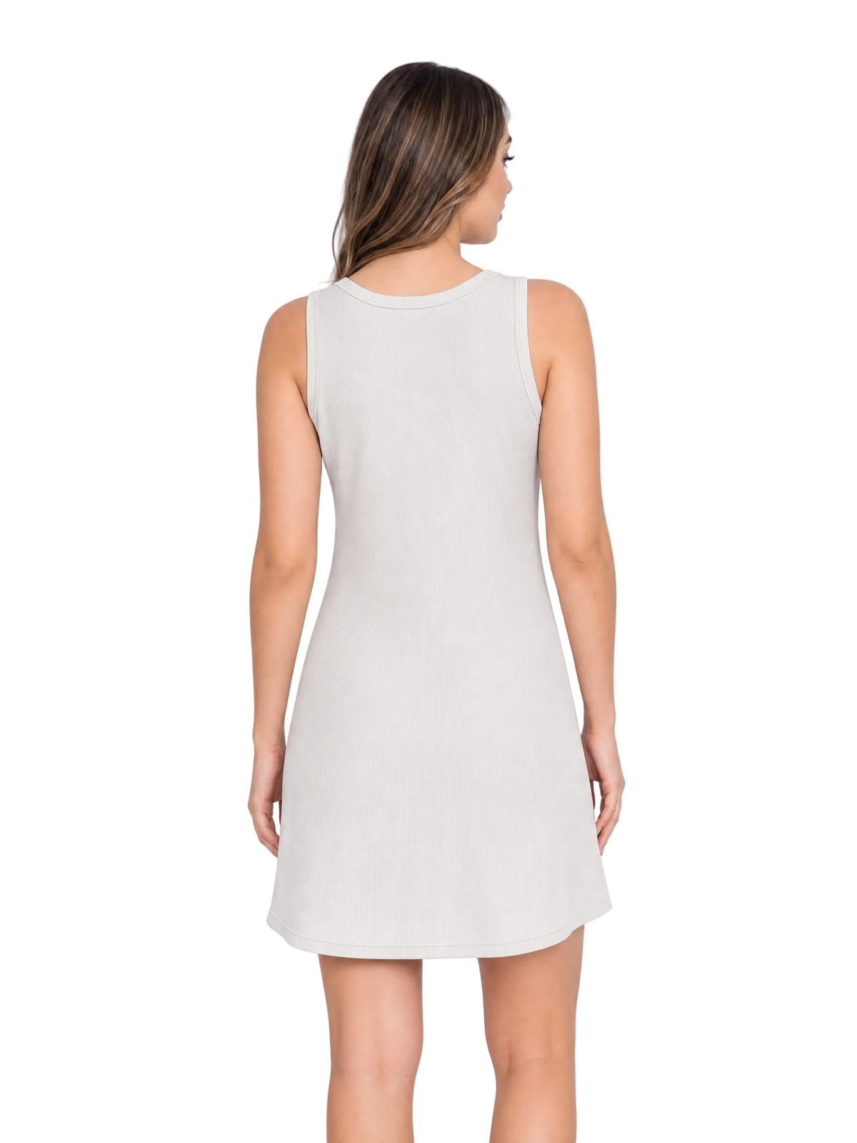 A woman viewed from the back wearing a sleeveless, knee-length light gray dress against a plain white studio background.