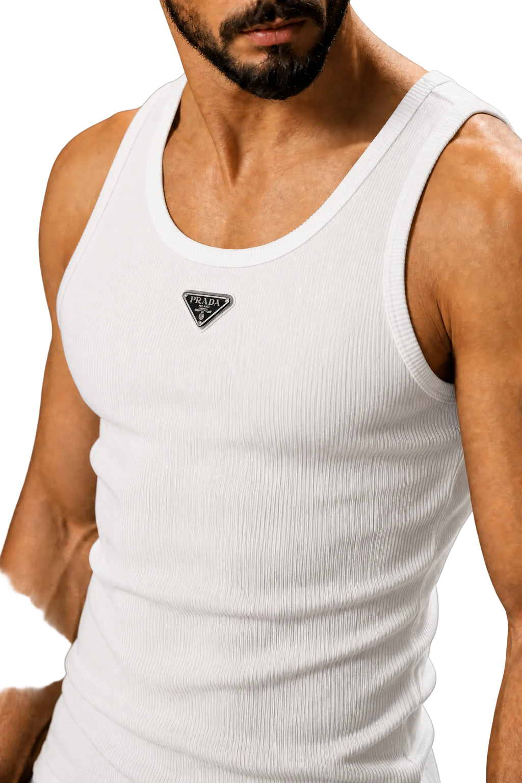 A close-up of a man wearing a white ribbed tank top with a small black triangular logo patch on the chest, set against a neutral gray background.