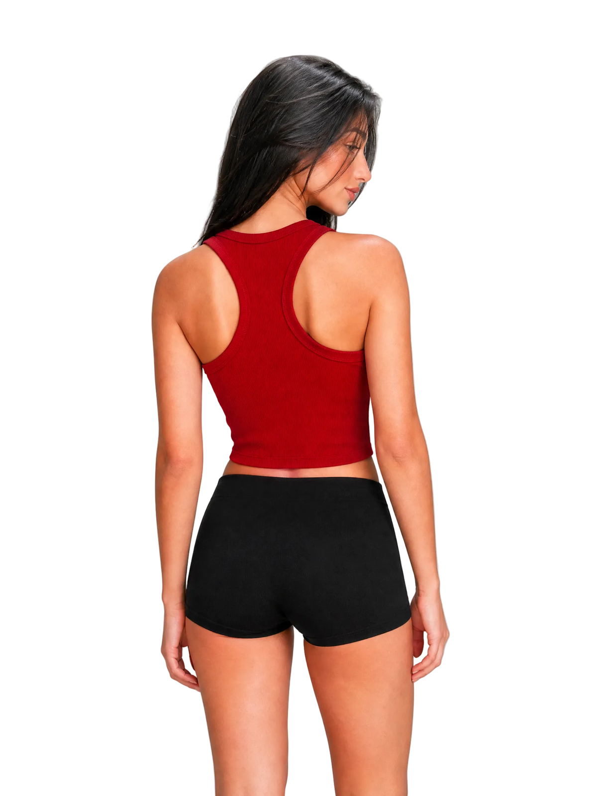 A woman shown from the back wearing a red racerback crop top and black athletic shorts against a plain light gray studio background.